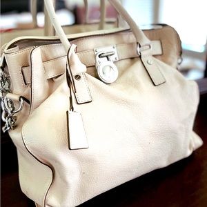 Michael Kors satchel style handbag.  Perfect size and neutral ivory color.